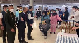 Thai nationals who evacuated from war-torn Ukraine land at Bangkok airport