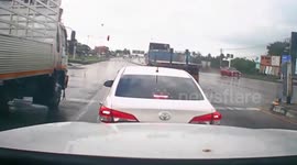 Lorry's brakes fail sending it slamming into pickup truck waiting at traffic lights