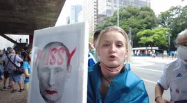Ukrainian woman appeals to Putin during anti-war protest in São Paulo, Brazil