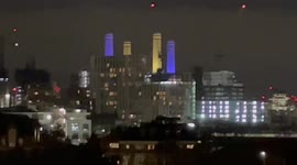 Ukrainian flag colours light up the chimneys of Battersea Power Station
