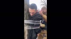 Ukraine's Armed Forces catch looter and tie him to tree. They ask: 'are you ashamed of stealing?'