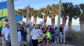 Group of people gather for a pro-Ukraine rally in the small coastal community of Corpus Christi, Texas south of San Antonio on Friday, March 4, 2022.
