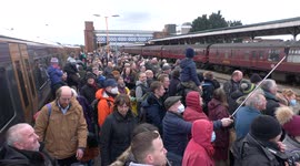 Hundreds gather to view famed Flying Scotsman locomotive as it travels through England