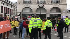 Extinction Rebellion’s Youth Climate Swarm block road in Piccadilly