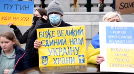 A large crowd takes part in a Solidarity with Ukraine protest in Trafalgar Square in London