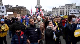 A large crowd takes part in a Solidarity with Ukraine protest in Trafalgar Square in London