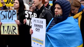 A large crowd takes part in a Solidarity with Ukraine protest in Trafalgar Square in London