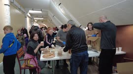 Ukrainian families, grandparents, parents as well as kids, in Uzhhorod working selflessly and tirelessly towards humanitarian relief efforts for thousands of displaced Ukrainians arriving in the city