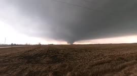 Timelapse footage of powerful tornado sweeping through outskirts of Winterset, Iowa