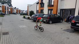 4-year-old boy pulls off crazy bicycle trick