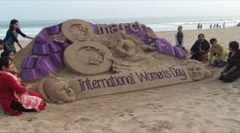 Female artists in India create stunning sand sculpture to mark International Women's Day