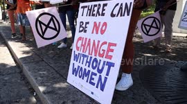 Female protesters gather in Cape Town to highlight climate issues on International Women's Day