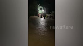 Pensioner trapped in house rescued during waist-high flood in the Philippines