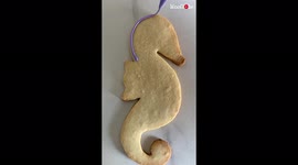 'Self-proclaimed 'Maker of Pretty Things' beautifully decorates a Seahorse Cookie '