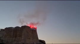 France: Yvan Colonna Supporters Light Flares, Unfurl Support Banners Atop Cliff In Bonifacio, Corsica