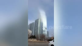 Rare 'Tyndall effect' spotted on skyscraper in China