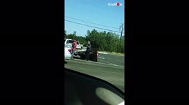 Helpful man rushes into busy road to the rescue of elderly man