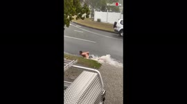 Australian man treats gutter as swimming pool during flood, loses underwear