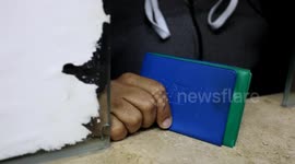 Palestinians wait to receive their IDs at the civil affairs office
