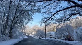 Driving through a snowy street after a snowstorm on March 10, 2022