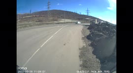Trucks collide head-on in southern Russia, scattering debris across road
