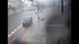 Fail | Young Man exiting Uber slips on wet sidewalk during rain