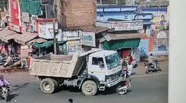 Lucky woman rider emerges unscathed after being hit by truck in central India
