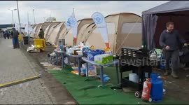 Desperate Ukrainian refugees arrive at accommodation centre from Polish border crossing