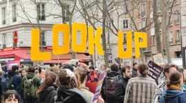 'Look up': Activists use signs inspired by the film Don't Look Up at Paris climate march