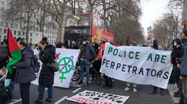 Sisters Uncut protestors block roads outside of New Scotland Yard in protest against Met Police