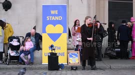 Ukraine violinist performs a fund raising concert on the Covent Garden Plaza in London