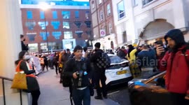 Smoke flares lit, rape alarms thrown at Charing Cross police station in London by Sarah Everard protesters