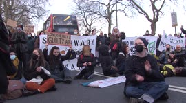 Anti-police protesters in London march to Charing Cross police station