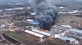 Drone footage of factory on fire in Derhachi, near Kharkiv, Ukraine