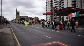 The Lord Mayor of Manchester, Cllr Tommy Judge, leads the St Patrick's Day parade, Manchester, England, United Kingdom,