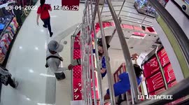 Quick-thinking gold shop assistant stops thief with a flying kick