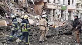 Emergency services pick through rubble after Russian attack in Ukrainian city ofKharkiv