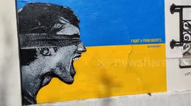 French street artist pay tribute to Ukraine with supportive murals in Paris