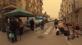 Spanish Market Engulfed With Dust As Sahara Storm Settles on Southern Spanish Town