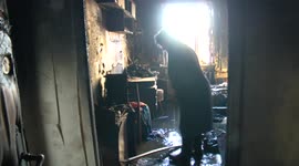 Inside the damaged residential building in Kyiv that was targeted by Russian shells