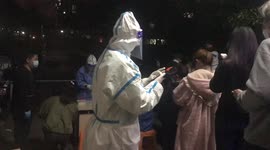 Shanghai residents forced to do COVID-19 test at night after positive cases nearby