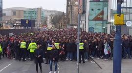 Atletico Madrid fans make their way down Manchester Deansgate ahead of Champions League clash at Old Trafford