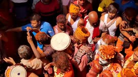 Holi celebration with pyre ashes at Varanasi's Manikarnika Ghat