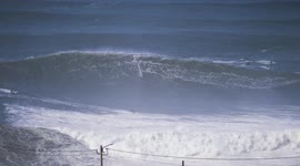 Crazy wipeout in Nazare big wave surf and heroic jet ski rescue