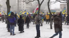 Toronto residents brave snowstorm to rally at US Consulate for peace in Ukraine
