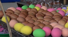 Thai street food vendor sells rainbow-coloured hard-boiled eggs