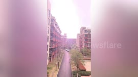 Boy startled by lightning bolt that struck nearby as he recorded rain in China