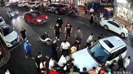 Chinese residents lift up car to rescue girl trapped underneath