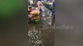 Thai market swamped with flash floods after heavy rain