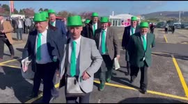 Punters arrive at Cheltenham Festival in green hats to mark St Patrick's Day